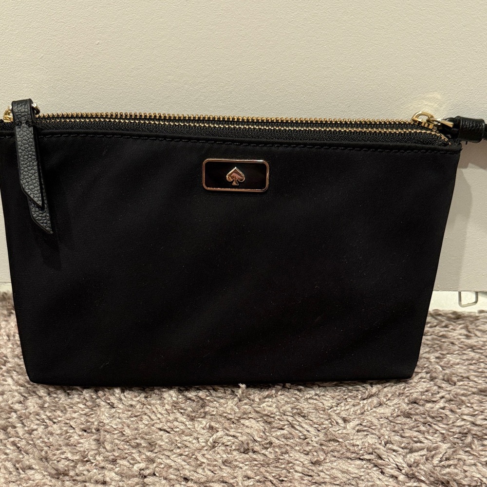 Kate Spade Black wristlet with Gold Zipper